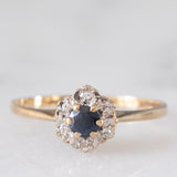 Anello a margherita vintage in oro giallo 9K con zaffiro (0.20ct ca.) e diamanti (0.03ctw ca.), anno 1985