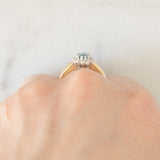 Anello a margherita vintage in oro giallo 9K con topazio azzurro (0.55ct ca.) e diamanti (0.05ctw ca.)
