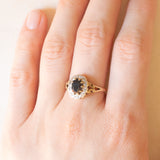 Anello a margherita vintage in oro giallo e bianco 9K con zaffiro (1ct ca.) e diamanti (0.05ctw ca.), anno 1989