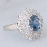 Anello a margherita vintage in platino con zaffiro (1.54ct) e diamanti (1.01ctw), anni ‘80