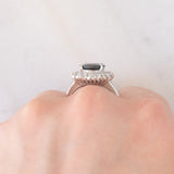 Anello a margherita vintage in platino con zaffiro (4.30ct) e diamanti (1.05ctw), anni ‘80