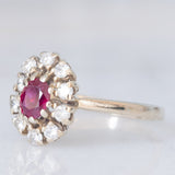 Anello a margherita vintage in oro bianco 14K con rubino (0.50ct ca.) e diamanti (0.30ctw ca.), anni ‘70/‘80