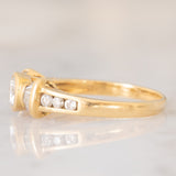 *RISERVATO* Anello “ballerina” in oro giallo 18K con diamanti di taglio brillante e di taglio tapered (0.71ctw ca.), anni ‘80