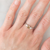 Trilogy vintage in platino con diamante centrale fancy brown (0.57ct) e diamanti laterali (0.20ctw)