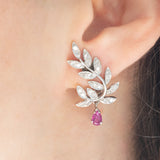 Orecchini vintage in oro bianco 18K con rubini (0.80ctw ca.) e diamanti (1ctw ca.), anni ‘90