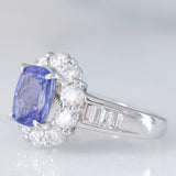 Anello a margherita vintage in platino con tanzanite (2.04ct) e diamanti di taglio brillante e baguette (1.35ctw), anni ‘90