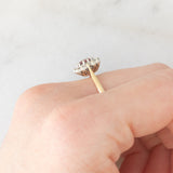 Anello a margherita vintage in oro giallo 9K con rubino (0.35ct ca.) e diamanti (0.06ctw ca.), anno 1984