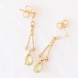 Orecchini pendenti vintage in oro giallo 9K con peridoti verde chiaro (0.70ctw ca.)