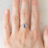 Anello a margherita vintage in oro giallo e bianco 9K con tanzanite (0.60ct ca.), anni ‘90