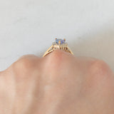 Anello a margherita vintage in oro giallo e bianco 9K con tanzanite (0.60ct ca.), anni ‘90