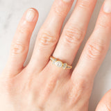 *RISERVATO* Anello “ballerina” in oro giallo 18K con diamanti di taglio brillante e di taglio tapered (0.71ctw ca.), anni ‘80