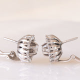 Orecchini a margherita vintage in oro bianco 18K con diamanti di taglio brillante (1ctw ca.), anni ‘60/‘70