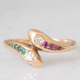 Anello contrarier antico a doppio serpente in oro giallo 14K con smeraldi, rubini e diamanti di taglio vecchio (0.16ctw ca.), anni ‘20