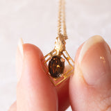 Collana vintage con catenina in oro giallo 9K e con ciondolo in oro giallo 9K con quarzo citrino (0.40ct ca.), anno 1978