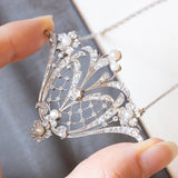 Collier Art Nouveau in oro bianco 18K con perline bianche e diamanti, anni ‘20