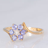Anello contrarier con fiore in oro giallo 9K con tanzaniti (0.36ctw ca.) e diamante, anni ‘90