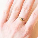 Anello vintage a forma di serpente in oro giallo 18K con zaffiro (0.20ct ca.) e diamanti, anni ‘60/‘70