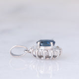 Ciondolo a margherita vintage in platino con zaffiro (0.64ct) e diamanti (0.23ctw)