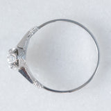 Solitario Art Déco in oro bianco 18K con diamante di taglio brillante (0.15ct ca.), anni ‘30