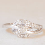 Anello vintage a nodo in oro bianco 9K con diamanti (0.06ctw ca.), anni ‘90