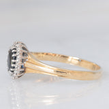 Anello a margherita vintage in oro giallo 9K con zaffiro (0.70ct ca.) e diamanti (0.08ctw ca.), anno 1991