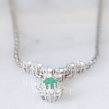 Collier vintage in oro bianco 18K con smeraldo (0.40ct ca.) e diamanti di taglio brillante (2.10ctw ca.), anni ‘80