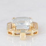 Ciondolo a margherita in oro giallo 14K con acquamarina (3.30ct ca.) e diamanti (0.22ctw ca.), anni ‘70