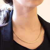 Collana vintage in oro giallo 8K con maglia omega