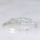 Trilogy vintage in oro bianco 9K con zaffiri verde sintetici (0.80ctw ca.) e diamanti, anni ‘90