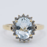 Anello a margherita vintage in oro giallo 9K con acquamarina (2ct ca.) e diamanti (0.18ctw ca.), anni 2000
