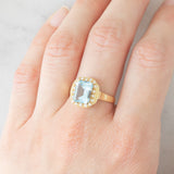 Anello vintage in oro giallo 14K con topazio azzurro (2.80ct ca.) e diamanti di taglio brillante (0.16ctw ca.), anni ‘80/‘90