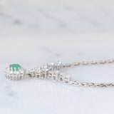 Collier vintage in oro bianco 18K con smeraldo (0.40ct ca.) e diamanti di taglio brillante (2.10ctw ca.), anni ‘80