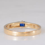 Solitario a fascia vintage in oro giallo 14K con zaffiro di taglio carré (0.18ct ca.), anni ‘70