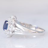 Anello a margherita vintage in platino con zaffiro (0.30ct) e diamanti (0.32ctw), anni ‘80