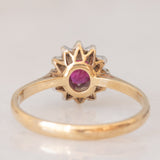 Anello a margherita vintage in oro giallo 9K con rubino (0.35ct ca.) e diamanti (0.06ctw ca.), anno 1984