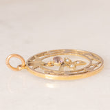 Ciondolo antico in oro giallo 9K con decorazioni naturalistiche e con rodine decorato da perline bianche e da ametista, anni ‘10/‘20