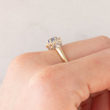 Anello a margherita vintage in oro giallo 9K con zaffiro (0.35ct ca.) e diamanti (0.14ctw ca.), anni ‘80