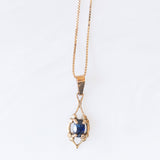 Collana vintage con catenina in oro giallo 9K e con ciondolo in oro giallo 9K con zaffiro (0.30ct ca.), anno 1965