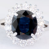 Anello a margherita vintage in platino con zaffiro (4.30ct) e diamanti (1.05ctw), anni ‘80
