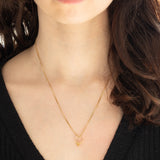 Collana vintage con ciondolo ad anello a margherita in oro giallo 18K con quarzo citrino e diamanti, anni ‘80