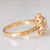 Anello a margherita vintage in oro giallo 18K con zaffiro rosa (1.70ct ca.) e diamanti di taglio brillante (1ctw ca.), anni ‘60/‘70