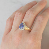 Anello a margherita vintage in oro giallo e bianco 14K con tanzanite (2.10ct ca.) e diamanti (0.30ctw ca.), anni ‘80