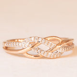 Anello intrecciato vintage in oro rosa e bianco 9K con diamanti, anni ‘90