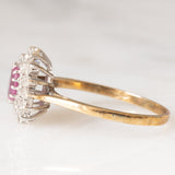 Anello a margherita vintage in oro giallo 9K con rubino (0.40ct ca.) e diamanti (0.28ctw ca.), anno 1987