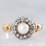 Anello a margherita antico in oro giallo 14K e argento con perla bianca e diamanti di taglio rosetta (0.13ctw ca.), primi del ‘900
