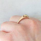 Solitario antico a fascia in oro giallo 14K con diamante di taglio rosetta (0.25ct ca.), primi del ‘900