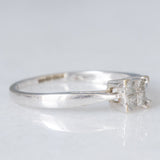 Anello “solitario” vintage in oro bianco 9K con illusion setting diamanti di taglio princess (0.15ctw ca.), anni ‘80/‘90
