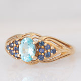 Anello vintage in oro giallo 9K con apatite (0.80ctw ca.) e zaffiri (0.37ctw ca.), anni ‘80/‘90