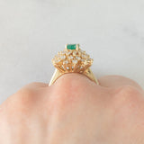 Anello ballerina vintage in oro giallo 14K con smeraldo (0.50ct ca.) e diamanti di taglio brillante e tapered (0.96ctw ca.), anni ‘80