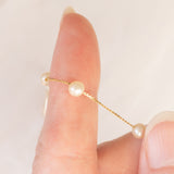Collana vintage in oro giallo 18K con perle bianche